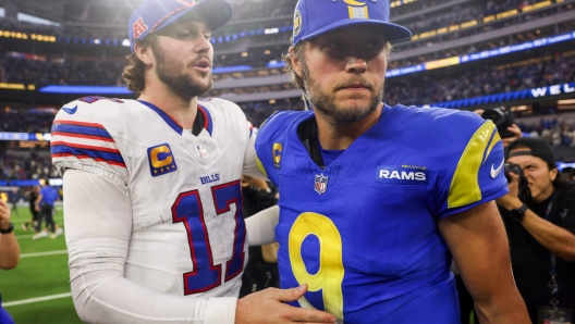 INGLEWOOD, CALIFORNIA - DECEMBER 08: Matthew Stafford #9 of the Los Angeles Rams talks with Josh Allen #17 of the Buffalo Bills after the Rams defeated the Bills, 44-42, at SoFi Stadium on December 08, 2024 in Inglewood, California.   Katelyn Mulcahy/Getty Images/AFP (Photo by Katelyn Mulcahy / GETTY IMAGES NORTH AMERICA / Getty Images via AFP)