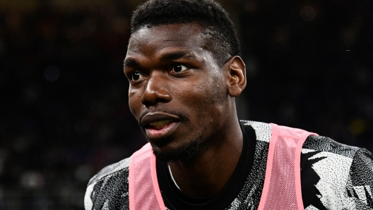 (FILES) Juventus' French midfielder Paul Pogba looks on ahead of the Italian Cup semi-final second leg football match between Inter Milan and Juventus at the Giuseppe-Meazza (San Siro) stadium in Milan, on April 26, 2023. (Photo by Isabella BONOTTO / AFP)