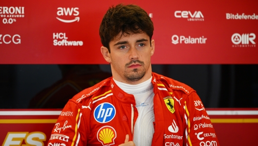 ABU DHABI, UNITED ARAB EMIRATES - DECEMBER 10: Charles Leclerc of Monaco and Ferrari prepares to drive in the garage during Formula 1 testing at Yas Marina Circuit on December 10, 2024 in Abu Dhabi, United Arab Emirates. (Photo by Clive Mason/Getty Images)