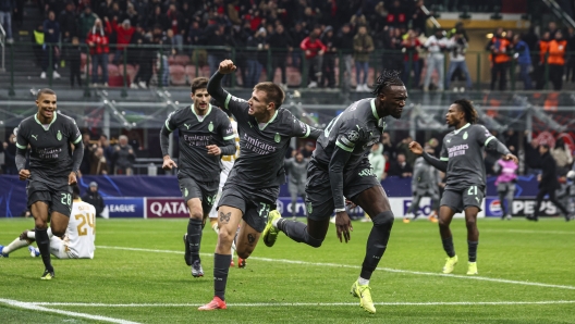 MILAN, ITALY - DECEMBER 11: Tammy Abraham of AC Milan celebrates after scoring the his team's seco goal during the UEFA Champions League 2024/25 League Phase MD6 match between AC Milan and FK Crvena Zvezda at Stadio San Siro on December 11, 2024 in Milan, Italy. (Photo by Giuseppe Cottini/AC Milan via Getty Images)