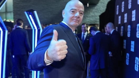 FIFA president Gianni Infantino arrives at the UEFA Preliminary Draw for the 2026 FIFA World Cup at FIFA headquarters in Zurich, Switzerland, Friday, December 13, 2024. (AP Photo/Martin Meissner)