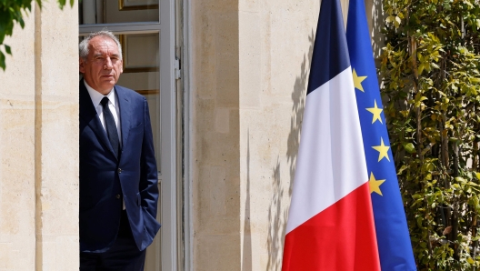 (FILES) France's centrist Democratic Movement (MoDem) party leader and Mayor of Pau Francois Bayrou waits ahead of talks hold by France's President at the presidential Elysee Palace, in Paris, on June 21, 2022, two days after France's legislative elections. Emmanuel Macron named François Bayrou as French Prime Minister, the Elysee presidential Palace announced on December 13, 2024. (Photo by Ludovic MARIN / AFP)