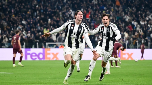 TURIN, ITALY - DECEMBER 11: Dusan Vlahovic of Juventus celebrates after scoring his team's first goal with teammate Kenan Yildiz during the UEFA Champions League 2024/25 League Phase MD6 match between Juventus and Manchester City at Juventus Stadium on December 11, 2024 in Turin, Italy. (Photo by Daniele Badolato - Juventus FC/Juventus FC via Getty Images)