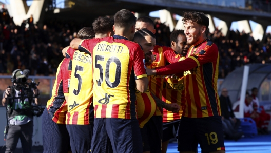 LECCE, ITALY - DECEMBER 15: Tete Morente of Lecce celebrates with their teammates after scoring his team's first goal during the Serie A match between Lecce and Monza at Stadio Via del Mare on December 15, 2024 in Lecce, Italy. (Photo by Maurizio Lagana/Getty Images)