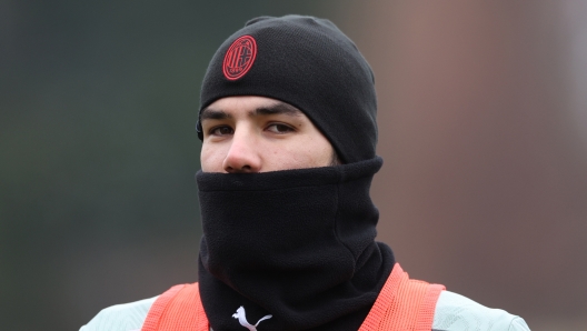 CAIRATE, ITALY - DECEMBER 08:Theo Hernandez of AC Milan looks on during AC Milan training session at Milanello on December 08, 2024 in Cairate, Italy. (Photo by Claudio Villa/AC Milan via Getty Images)