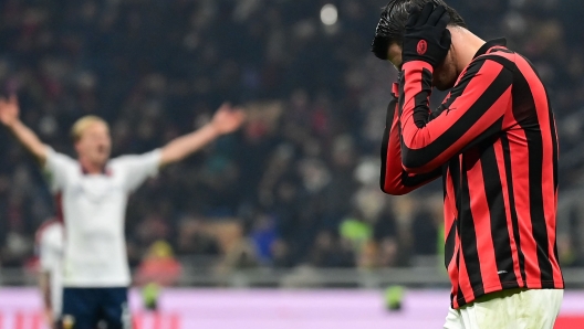 AC Milan's Spanish forward #07 Alvaro Morata reacts during the Italian Serie A football match between AC Milan and Genoa at the San Siro Stadium in Milan, on December 15, 2024. (Photo by Piero CRUCIATTI / AFP)