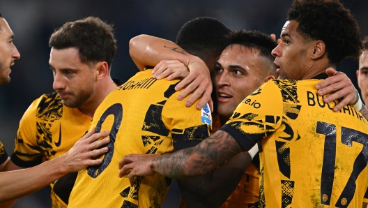 ROME, ITALY - DECEMBER 16:  Marcus Thuram of FC Internazionale celebrates with team-mates after scoring the goal during the Serie A match between SS Lazio and FC Internazionale at Stadio Olimpico on December 16, 2024 in Rome, Italy. (Photo by Mattia Ozbot - Inter/Inter via Getty Images)