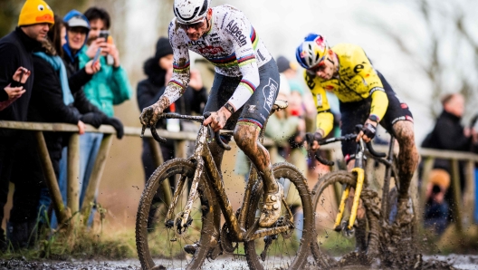 Dutch Mathieu Van Der Poel (L) and Belgian Wout van Aert compete during the men's elite race of the 'GP Sven Nys' cyclocross cycling event, stage 4 out of 8 of the X2O Badkamers 'Trofee Veldrijden' competition, in Baal on January 1, 2024. (Photo by JASPER JACOBS / Belga / AFP) / Belgium OUT