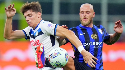 Federico Dimarco (FC Inter); Atalanta?s Marco Palestra  during the Serie A soccer match between Inter and Atalanta at the San Siro Stadium in Milan, north Italy - Friday , August 30, 2024. Sport - Soccer . (Photo by Spada/Lapresse)