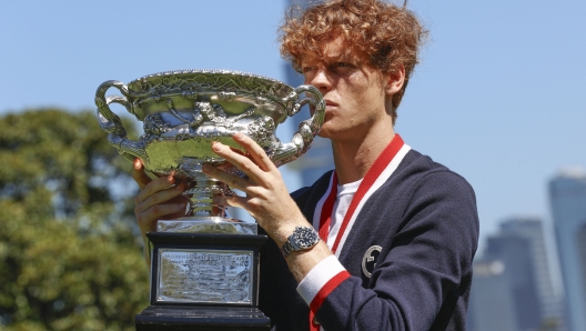 Jannik Sinner of Italy is posing with the Norman Brookes Challenge Cup after winning the 2024 Australian Open Final at the Royal Botanic Gardens in Melbourne, Australia, on January 29, 2024. (Photo by Ciro De Luca/NurPhoto) (Photo by Ciro De Luca / NurPhoto / NurPhoto via AFP)