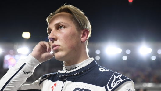 (FILE PHOTO) F1 Driver Liam Lawson Joins Red Bull LUSAIL CITY, QATAR - OCTOBER 07: Liam Lawson of New Zealand and Scuderia AlphaTauri prepares to drive on the grid during the Sprint ahead of the F1 Grand Prix of Qatar at Lusail International Circuit on October 07, 2023 in Lusail City, Qatar. (Photo by Rudy Carezzevoli/Getty Images)