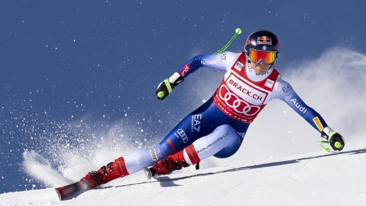 epa11787934 Sofia Goggia of Italy in action during the women's Super-G race at the Alpine Skiing FIS Ski World Cup, in St. Moritz, Switzerland, 21 December 2024.  EPA/JEAN-CHRISTOPHE BOTT