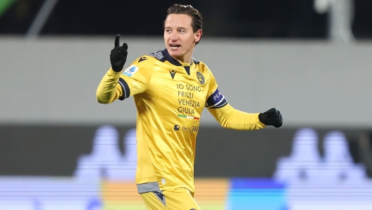 FLORENCE, ITALY - DECEMBER 23: Florian Thauvin of Udinese Calcio celebrates after scoring his team's second goal during the Serie A match between Fiorentina and Udinese at Stadio Artemio Franchi on December 23, 2024 in Florence, Italy. (Photo by Gabriele Maltinti/Getty Images)