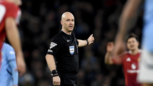 epa11779291 Referee Anthony Taylor reacts during the English Premier League soccer match between Manchester City and Manchester United, in Manchester, Britain, 15 December 2024.  EPA/PETER POWELL