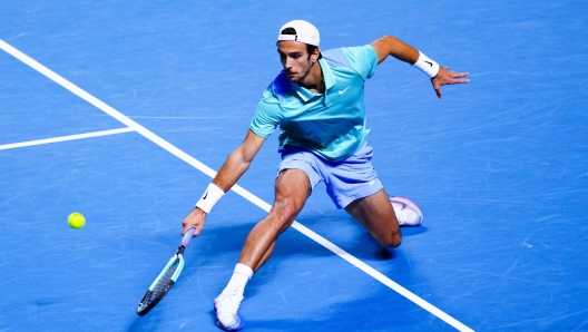 Italy's Lorenzo Musetti returns the ball to Britain's Jack Draper (unseen) during the semi-final men's single match of the ATP Erste Bank Open tennis tournament on October 26, 2024 in Vienna, Austria. (Photo by Eva MANHART / APA / AFP) / Austria OUT