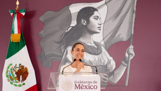 This handout photo released by Mexican Presidency press office shows Mexico's President Claudia Sheinbaum delivering a message during her visit to the port city of Mazatlan, Sinaloa state, Mexico on December 22, 2024. (Photo by HANDOUT / Mexico's Presidency press office / AFP) / RESTRICTED TO EDITORIAL USE - MANDATORY CREDIT "AFP PHOTO / MEXICO'S PRESIDENCY PRESS OFFICE" - NO MARKETING NO ADVERTISING CAMPAIGNS - DISTRIBUTED AS A SERVICE TO CLIENTS