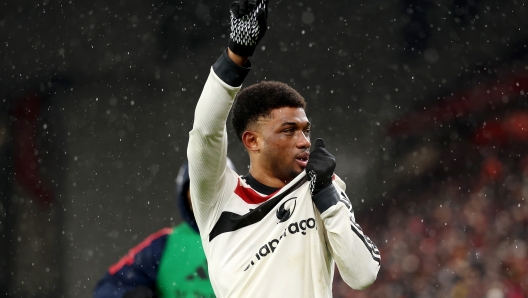 LIVERPOOL, ENGLAND - JANUARY 05: Amad Diallo of Manchester United celebrates scoring his team's second goal during the Premier League match between Liverpool FC and Manchester United FC at Anfield on January 05, 2025 in Liverpool, England. (Photo by Carl Recine/Getty Images)