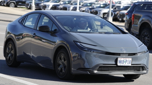 epa11261493 A Toyota Prius drives past a Toyota dealership in Round Rock, Texas, USA, 05 April 2024. In the initial quarter, Toyota Motor North America (TMNA) disclosed sales figures of 565,098 vehicles, marking a 20.3 percent increase in volume and a 17.2 percent rise in DSR compared to March 2023. Electrified vehicle sales for the same period amounted to 206,850 units, constituting 36.6 percent of the total sales volume.  EPA/ADAM DAVIS