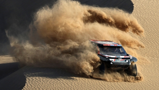 Qatari driver Nasser Al-Attiyah steers his car assisted by his co-driver Edouard Boulanger during stage 2B of the 47th Dakar Rally between Bisha and Bisha, on January 6, 2025. (Photo by Valery HACHE / AFP)