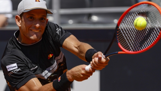 Francesco Passaro of Italy during his men's singles 3rd round match against Nuno Borges of Portugal (not pictured) at the Italian Open tennis tournament in Rome, Italy, 12 May 2024.  ANSA/FABIO FRUSTACI