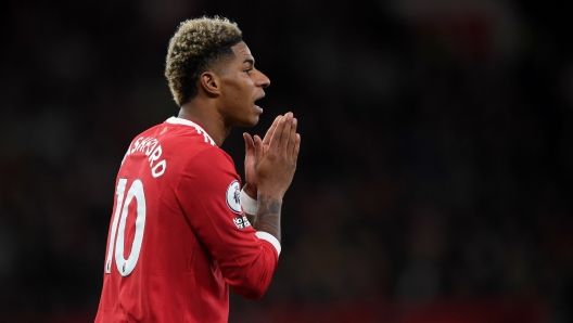 MANCHESTER, ENGLAND - MARCH 12: Marcus Rashford of Manchester United reacts during the Premier League match between Manchester United and Tottenham Hotspur at Old Trafford on March 12, 2022 in Manchester, England. (Photo by Michael Regan/Getty Images)