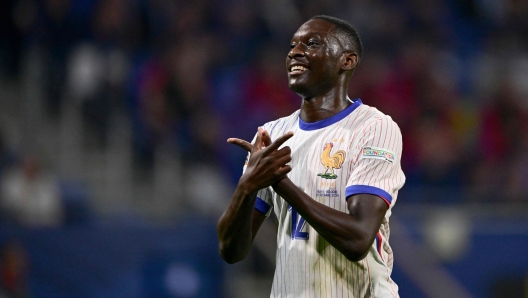 (FILES) France's forward #12 Randal Kolo Muani celebrates after scoring France's first goal during the UEFA Nations League, League A - Group 2 first leg football match between France and Belgium at the Parc Olympique Lyonnais in Lyon on September 9, 2024. France's striker Randal Kolo Muani's future at PSG appears hopeless, as he no longer seems to fit in with Luis Enrique's game plan, to the point where a departure this winter is a real possibility. (Photo by Olivier CHASSIGNOLE / AFP)