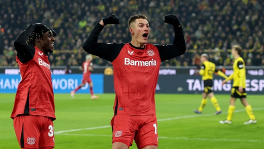 DORTMUND, GERMANY - JANUARY 10: Patrik Schick of Bayer 04 Leverkusen celebrates after scoring his teams second goal during the Bundesliga match between Borussia Dortmund and Bayer 04 Leverkusen at Signal Iduna Park on January 10, 2025 in Dortmund, Germany. (Photo by Lars Baron/Getty Images)