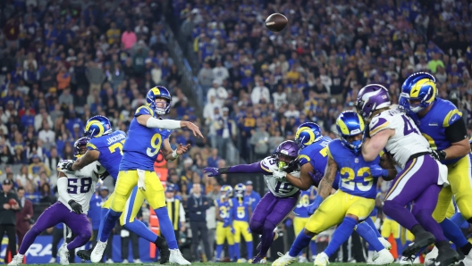 GLENDALE, ARIZONA - JANUARY 13: Matthew Stafford #9 of the Los Angeles Rams throws a pass during the third quarter against the Minnesota Vikings during the NFC Wild Card Playoff at State Farm Stadium on January 13, 2025 in Glendale, Arizona.   Christian Petersen/Getty Images/AFP (Photo by Christian Petersen / GETTY IMAGES NORTH AMERICA / Getty Images via AFP)