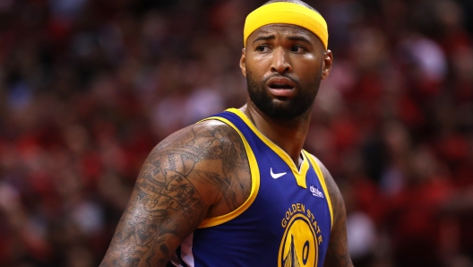 TORONTO, ONTARIO - JUNE 02: DeMarcus Cousins #0 of the Golden State Warriors reacts against the Toronto Raptors in the second half during Game Two of the 2019 NBA Finals at Scotiabank Arena on June 02, 2019 in Toronto, Canada. NOTE TO USER: User expressly acknowledges and agrees that, by downloading and or using this photograph, User is consenting to the terms and conditions of the Getty Images License Agreement.   Gregory Shamus/Getty Images/AFP
== FOR NEWSPAPERS, INTERNET, TELCOS & TELEVISION USE ONLY ==