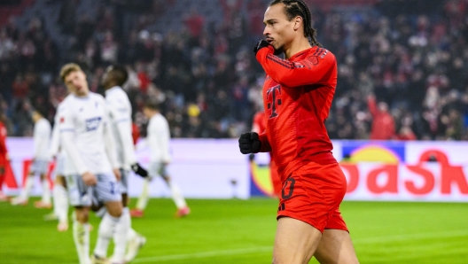 Munich's Leroy Sane, right, celebrates after scoring his side's fourth goal  during a German Bundesliga soccer match between FC Bayern Munich and TSG 1899 Hoffenheim in Munich, Germany, Wednesday, Jan. 15, 2025. (Tom Weller/dpa via AP)    Associated Press / LaPresse Only italy and Spain