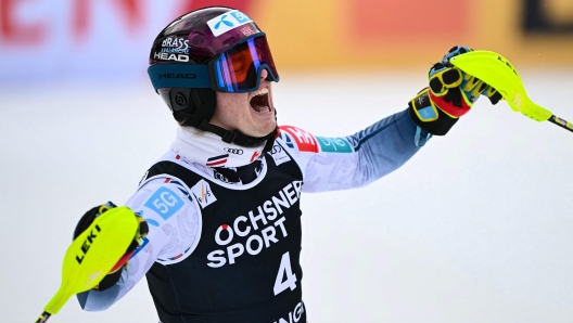 Norway's Atle Lie McGrath celebrates as he arrives in the finish area during the men's Slalom event at the FIS Alpine Skiing World Cup in Wengen on January 19, 2025. (Photo by Marco BERTORELLO / AFP)