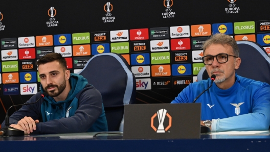 Lazio's coach, Marco Baroni, with his player Mario Gila, during the press conference ahead of tomorrow's Europa League football match SS Lazio vs Real Sociedad, in Rome, 22 January 2025. ANSA/MAURIZIO BRAMBATTI