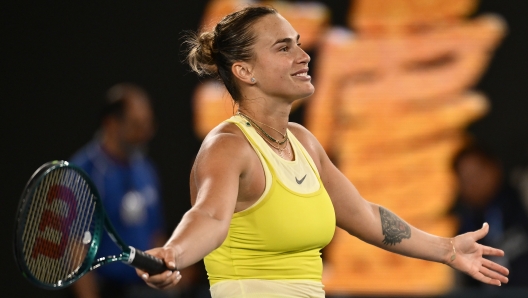 MELBOURNE, AUSTRALIA - JANUARY 23: Aryna Sabalenka celebrates winning the match point against Paula Badosa of Spain in the Women's Singles Semifinal during day 12 of the 2025 Australian Open at Melbourne Park on January 23, 2025 in Melbourne, Australia. (Photo by Hannah Peters/Getty Images)