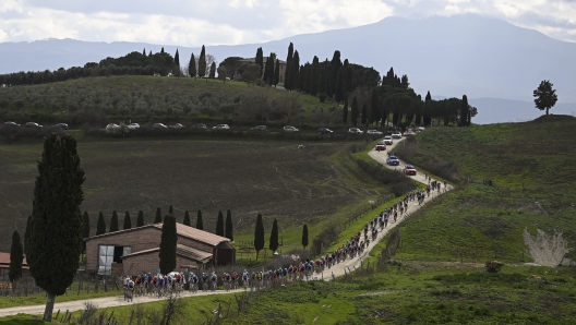 The pack rides during the men's elite race of the 'Strade Bianche' (White Roads)one day cycling race (215km) from and to Siena - Tuscany,- Saturday, MARCH 2, 2024. Sport - cycling . (Photo by Fabio Ferrari/LaPresse)