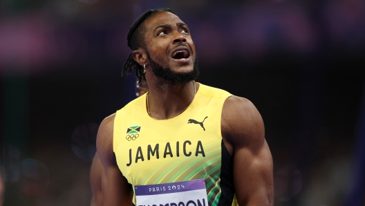 PARIS, FRANCE - AUGUST 04: Silver medalist Kishane Thompson of Team Jamaica celebrates during the Men's 100m Final on day nine of the Olympic Games Paris 2024 at Stade de France on August 04, 2024 in Paris, France. (Photo by Patrick Smith/Getty Images)