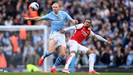 MANCHESTER, ENGLAND - MARCH 31: Erling Haaland of Manchester City is challenged by Gabriel of Arsenal during the Premier League match between Manchester City and Arsenal FC at Etihad Stadium on March 31, 2024 in Manchester, England. (Photo by Justin Setterfield/Getty Images) (Photo by Justin Setterfield/Getty Images)