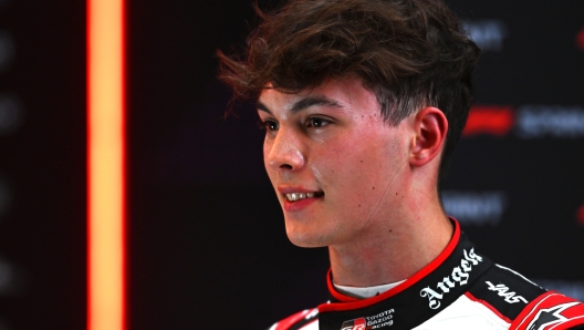 SAO PAULO, BRAZIL - NOVEMBER 01: 10th placed qualifier Oliver Bearman of Great Britain and Haas F1 talks to the media in the Paddock after Sprint Qualifying ahead of the F1 Grand Prix of Brazil at Autodromo Jose Carlos Pace on November 01, 2024 in Sao Paulo, Brazil. (Photo by Rudy Carezzevoli/Getty Images)