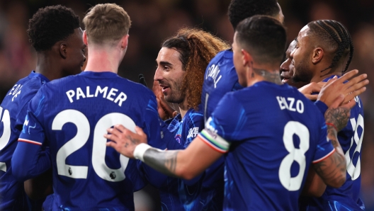 LONDON, ENGLAND - FEBRUARY 25: Marc Cucurella of Chelsea celebrates scoring his team's fourth goal with teammates during the Premier League match between Chelsea FC and Southampton FC at Stamford Bridge on February 25, 2025 in London, England. (Photo by Julian Finney/Getty Images)