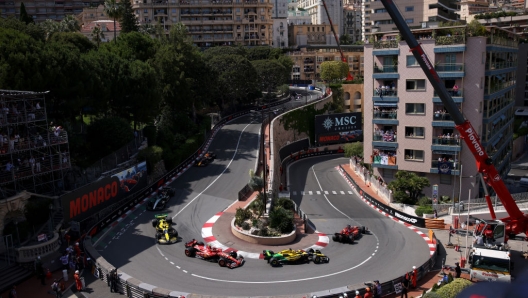 MONTE-CARLO, MONACO - MAY 26: Charles Leclerc of Monaco driving the (16) Ferrari SF-24 leads Oscar Piastri of Australia driving the (81) McLaren MCL38 Mercedes, Carlos Sainz of Spain driving (55) the Ferrari SF-24 and the field at the restart during the F1 Grand Prix of Monaco at Circuit de Monaco on May 26, 2024 in Monte-Carlo, Monaco. (Photo by Ryan Pierse/Getty Images)