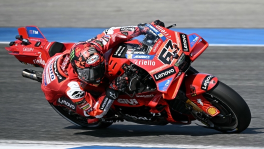 Ducati Lenovo's Italian rider Francesco Bagnaia rides during the practice session of the MotoGP Thailand Grand Prix at the Buriram International Circuit in Buriram on February 28, 2025. (Photo by Lillian SUWANRUMPHA / AFP)