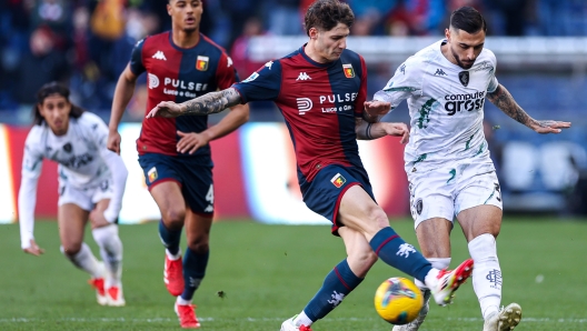 Genoa?s Italian defender Alessandro Zanoli (2nd from right) and Empoli's Italian defender Giuseppe Pezzella during the Italian Serie A soccer match Genoa Cfc vs Empoli Fc at Luigi Ferraris stadium in Genoa, Italy, 2 March 2025. ANSA/STRINGER