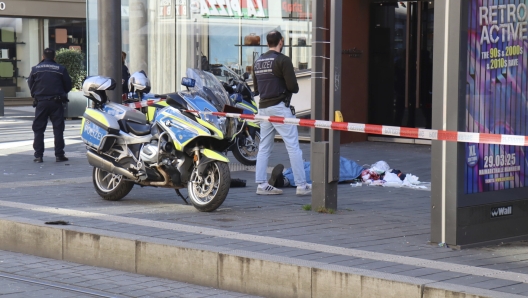 Police officers stand by during a major operation at the city center in Mannheim, Germany, after a serious incident, Monday March 3, 2025. (Ren Priebe/dpa via AP)