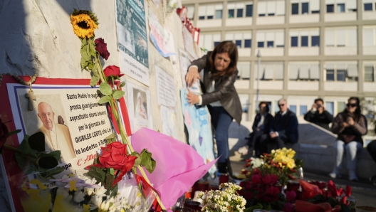 A placards are seen outside the Agostino Gemelli Polyclinic where Pope Francis is hospitalized in Rome, Tuesday, March 4, 2025. (AP Photo/Gregorio Borgia)