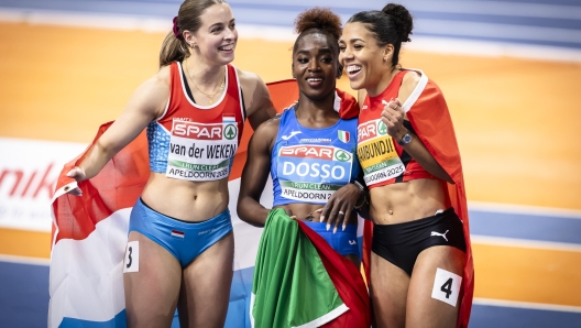 epa11952323 Silver medallist Mujinga Kambundji (R) of Switzerland, reacts next to Gold medallist Zaynab Dosso (C) of Italy, and third placed Patrizia van der Weken (L) of Luxembourg during the women's 60 meters final at the European Athletics Indoor Championships in Apeldoorn, Netherlands, 09 March 2025.  EPA/MICHAEL BUHOLZER