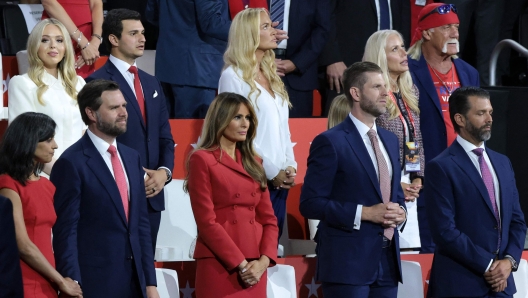 MILWAUKEE, WISCONSIN - JULY 18: Tiffany Trump, Michael Boulos, Vanessa Trump, Sky Daily, Professional entertainer and wrestler Hulk Hogan, Donald Trump Jr., Eric Trump, former first lady Melania Trump , Republican vice presidential candidate, U.S. Sen. J.D. Vance (R-OH) and Usha Chilukuri Vance look on during the fourth day of the Republican National Convention at the Fiserv Forum on July 18, 2024 in Milwaukee, Wisconsin. Delegates, politicians, and the Republican faithful are in Milwaukee for the annual convention, concluding with former President Donald Trump accepting his party's presidential nomination. The RNC takes place from July 15-18. Scott Olson/Getty Images/AFP (Photo by SCOTT OLSON / GETTY IMAGES NORTH AMERICA / Getty Images via AFP)