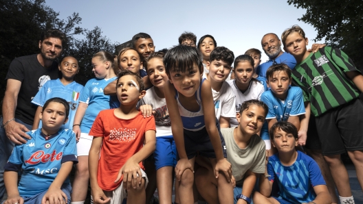 Young players from Spartak San Gennaro posing for a photo.