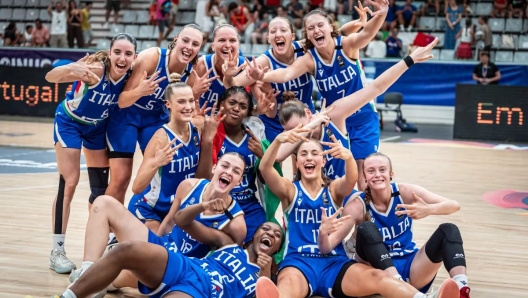 Italian U20 Women`s Basketball Team celebrating their bronze medal.