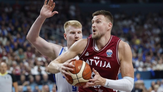Lauri Markkanen in mid-air during EuroBasket 2025