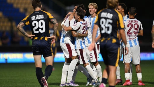 Football players celebrating a goal