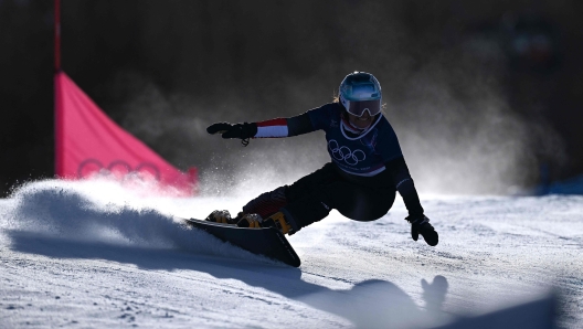 Austria's Claudia Riegler competes in the snowboard women's parallel giant Slalom elimination run at Livigno Snow Park during the Milano Cortina 2026 Winter Olympic Games, in Livigno (Valtellina), on February 8, 2026. (Photo by Kirill KUDRYAVTSEV / AFP)